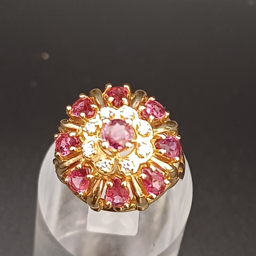 57 - Ruby and Diamond Raised Cluster Ring really eye catching.
- size O
- 14 ct
- weight 7.5 g