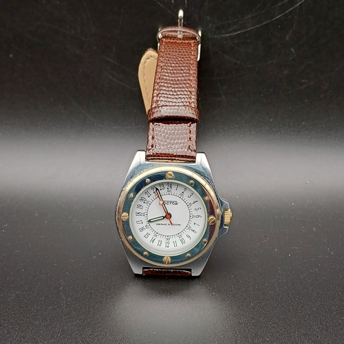 65 - Boctok (Vostok) Russian 24 Hour Watch in good working order and is a really lovely watch.