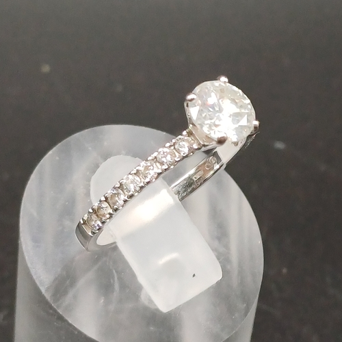 20 - Solitaire Diamond Ring with diamonds in shoulders set in 18 ct White Gold.
- size N
- weight 2.51g