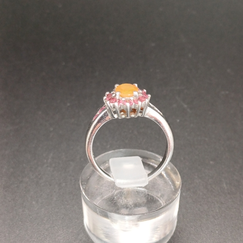 32 - Silver Cluster Ring with Orange Stone and Pink Crystals.
- 925 Silver
- weight 3.35 g
- size M
