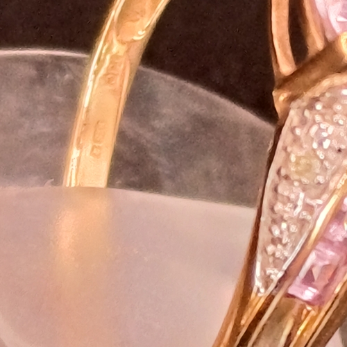 33 - Pink and White (possibly Sapphires) cluster ring set in 9ct yellow gold
- 9ct
-weight 2.15g
- size M