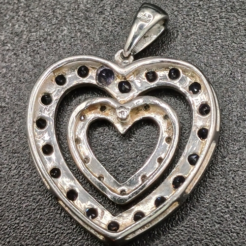 39 - Heart Shaped Pendant encrusted with white and lilac stones
- marked 925
- weight 1.79g