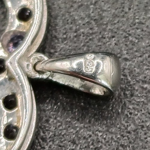 39 - Heart Shaped Pendant encrusted with white and lilac stones
- marked 925
- weight 1.79g