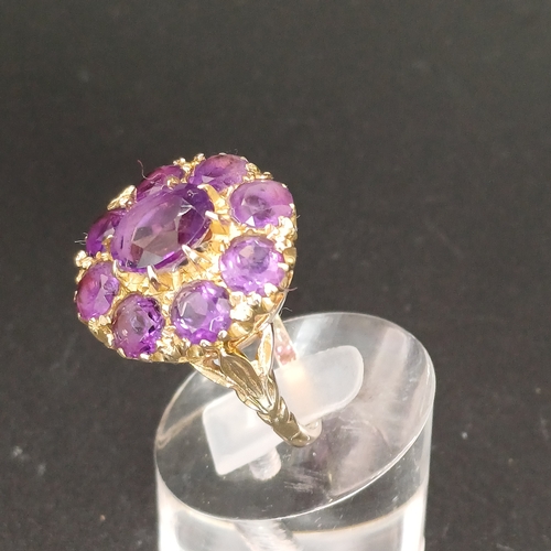 47 - Stunning Amethyst Cluster Ring set in a pretty shank
- 9ct gold
- weight 7 g
- size P
