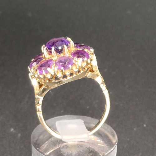 47 - Stunning Amethyst Cluster Ring set in a pretty shank
- 9ct gold
- weight 7 g
- size P