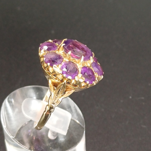 47 - Stunning Amethyst Cluster Ring set in a pretty shank
- 9ct gold
- weight 7 g
- size P