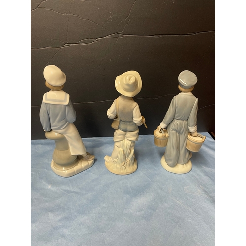 222 - Three Lladro Boy Figures in excellent condition