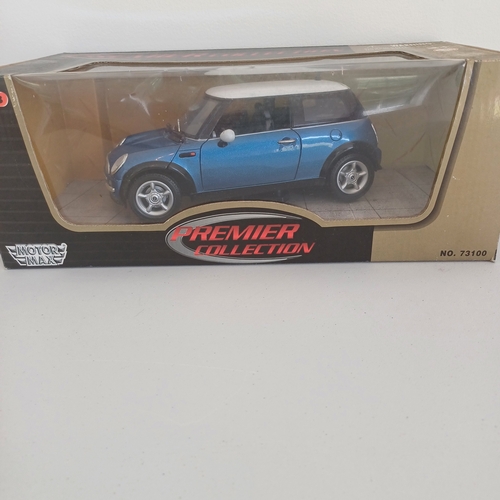 55 - Collection of Five Boxed Scale Model Cars: Triumph TR4 and Stag; Mini x 2; Jaguar E Cabriolet 1961