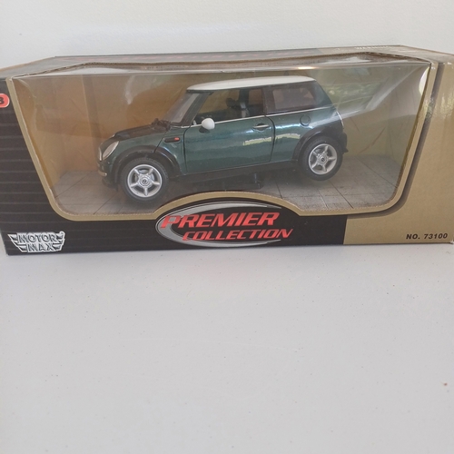 55 - Collection of Five Boxed Scale Model Cars: Triumph TR4 and Stag; Mini x 2; Jaguar E Cabriolet 1961