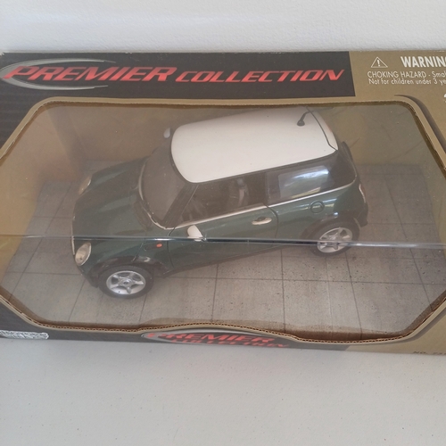 55 - Collection of Five Boxed Scale Model Cars: Triumph TR4 and Stag; Mini x 2; Jaguar E Cabriolet 1961