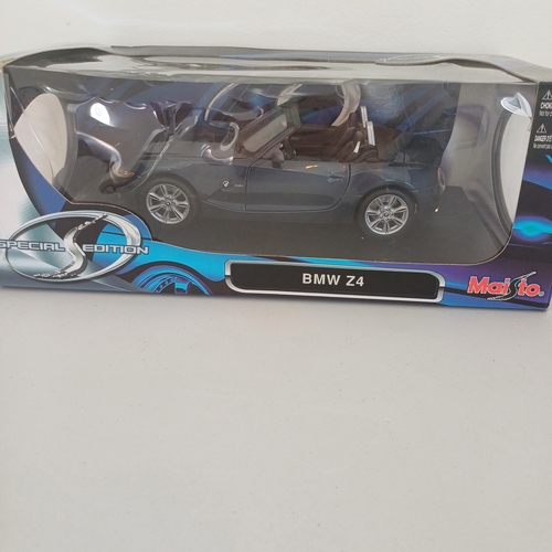 56 - Collection of five Scale Boxed Cars: Maserati GT Spyder and kit boxed car; BMW Z4; VW Beatle;   Jagu... 