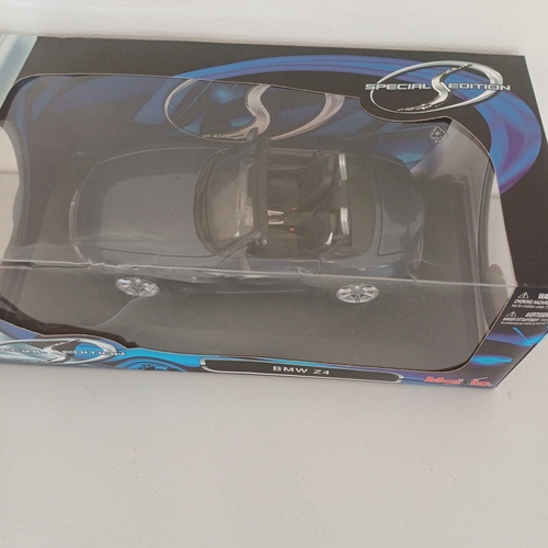 56 - Collection of five Scale Boxed Cars: Maserati GT Spyder and kit boxed car; BMW Z4; VW Beatle;   Jagu... 