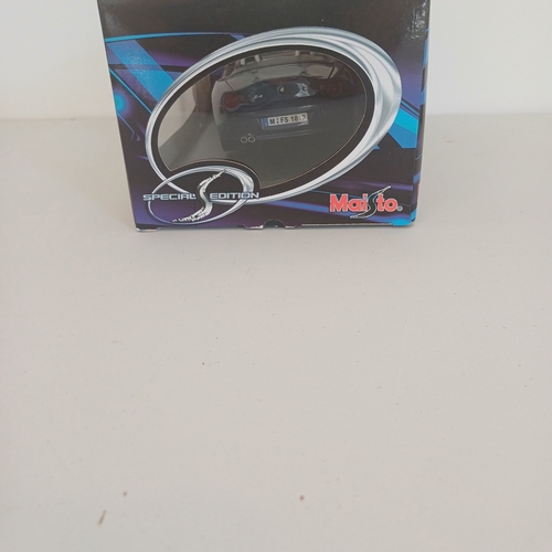 56 - Collection of five Scale Boxed Cars: Maserati GT Spyder and kit boxed car; BMW Z4; VW Beatle;   Jagu... 