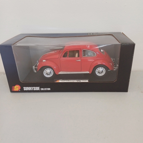 56 - Collection of five Scale Boxed Cars: Maserati GT Spyder and kit boxed car; BMW Z4; VW Beatle;   Jagu... 