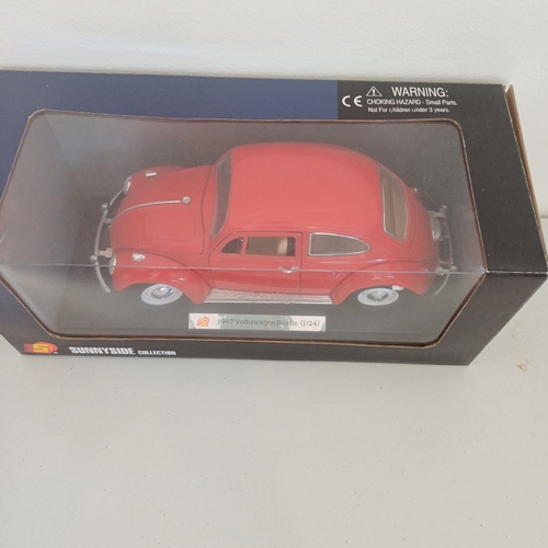 56 - Collection of five Scale Boxed Cars: Maserati GT Spyder and kit boxed car; BMW Z4; VW Beatle;   Jagu... 