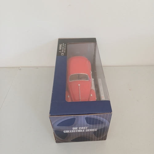 56 - Collection of five Scale Boxed Cars: Maserati GT Spyder and kit boxed car; BMW Z4; VW Beatle;   Jagu... 