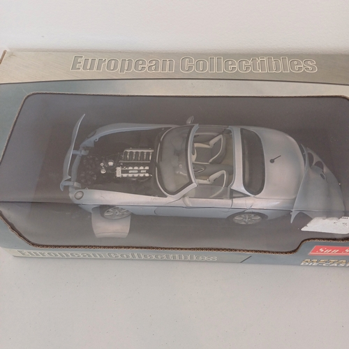 59 - Collection of Six Scaled Boxed Model Cars: 1947 MG TC Midget; MK2 Escort; 1971 Jaguar E-Type; Austin... 