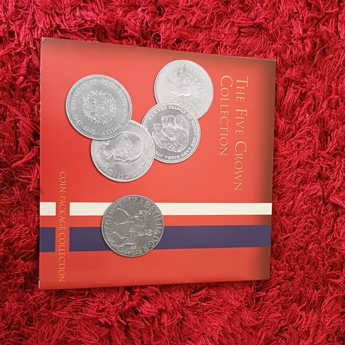 8 - Three Uncirculated Coins Sets:
1. Five Crowns (the Churchill and Queen Mother Coins have been placed... 
