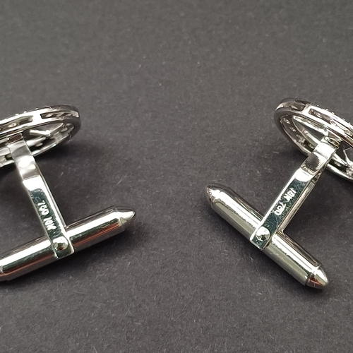 16 - Mercedes Diamond Encrusted Cuff Links all set in 18 carat white gold.  These are bespoke and quite s... 