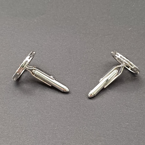 16 - Mercedes Diamond Encrusted Cuff Links all set in 18 carat white gold.  These are bespoke and quite s... 