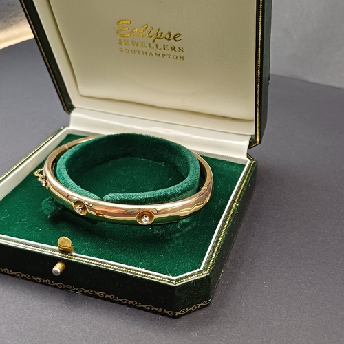 23 - Lovely Edwardian (circa 1910) Gold Bangle with Three Diamonds set in.
- weight 12.6g
- 9 carat yello... 