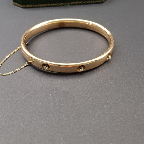 23 - Lovely Edwardian (circa 1910) Gold Bangle with Three Diamonds set in.
- weight 12.6g
- 9 carat yello... 