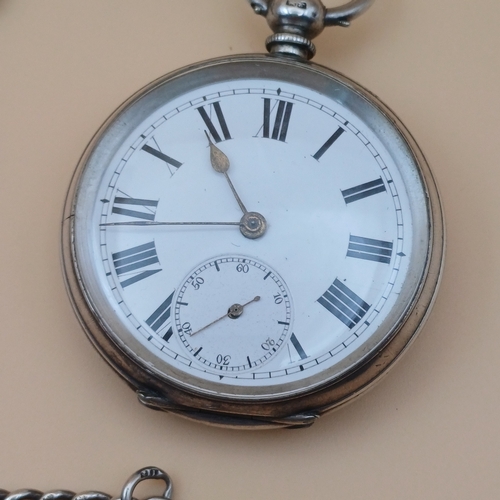 25 - Silver Open Face Pocket Watch, Albert Chain and key. There is no manufacturer on the face of the wat... 