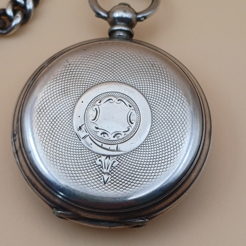 25 - Silver Open Face Pocket Watch, Albert Chain and key. There is no manufacturer on the face of the wat... 