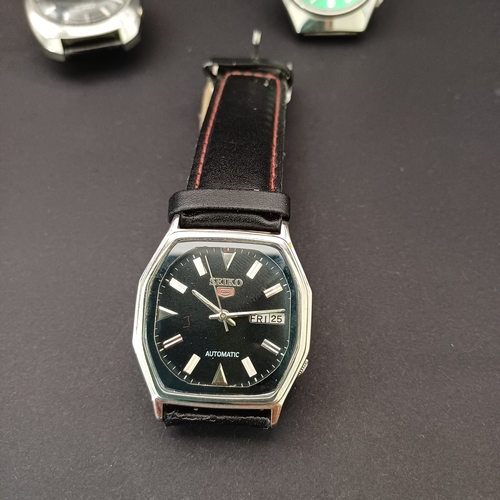 28 - Three Vintage Seiko Gent's Watches circa 1970's.  All three are Automatics, the self winders are wor... 