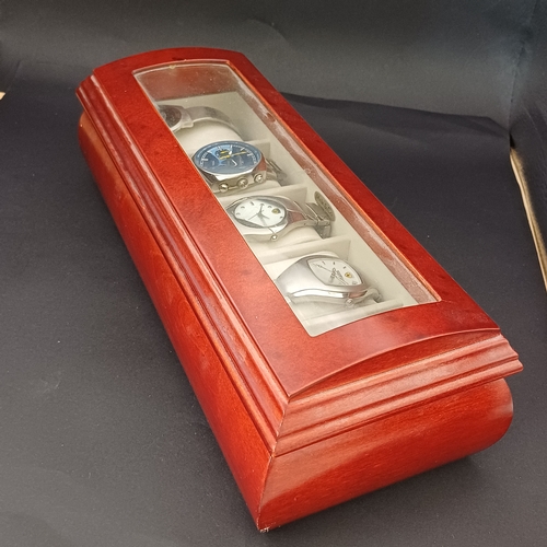 45 - Here we have a Vehicle Themed collection of five watches: Jaguar, Triumph, Ferrari x 2, Carbo.  Thes... 