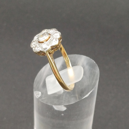 49 - Diamond Cluster Ring with Rose Cut Diamonds set in Platinum on an 18 carat yellow gold shank.
- appr... 