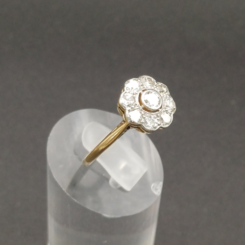 49 - Diamond Cluster Ring with Rose Cut Diamonds set in Platinum on an 18 carat yellow gold shank.
- appr... 