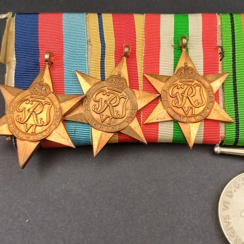 32 - Medal  bar consisting of Defence and Campaign Medals together with Three Stars World War II, Italy a... 