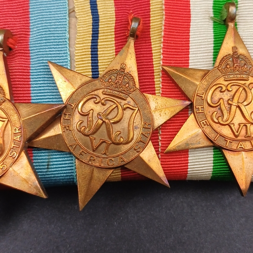 32 - Medal  bar consisting of Defence and Campaign Medals together with Three Stars World War II, Italy a... 