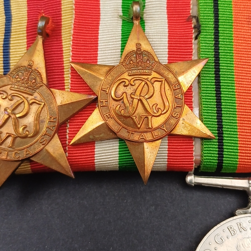 32 - Medal  bar consisting of Defence and Campaign Medals together with Three Stars World War II, Italy a... 