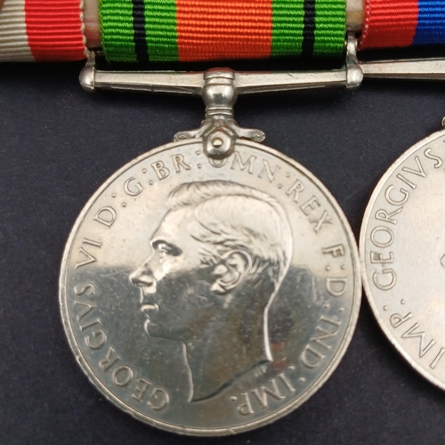 32 - Medal  bar consisting of Defence and Campaign Medals together with Three Stars World War II, Italy a... 