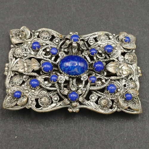 4 - Three pretty brooches each with different stones set in and all very striking.