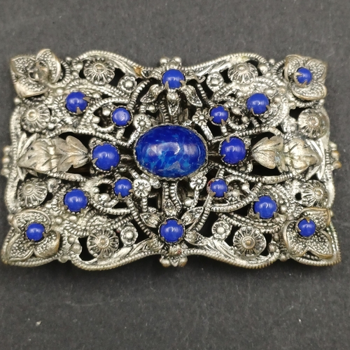 4 - Three pretty brooches each with different stones set in and all very striking.