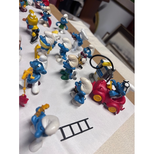 145 - The Smurfs  | 47 Vintage Figures Peyo Schleich | 1970s 1980s
Really cute collection.
