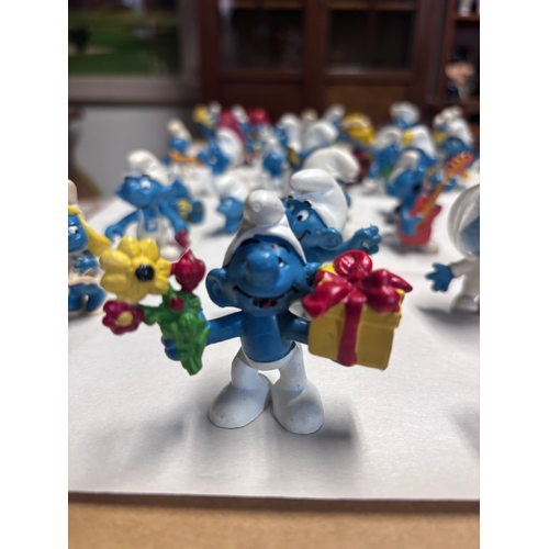 145 - The Smurfs  | 47 Vintage Figures Peyo Schleich | 1970s 1980s
Really cute collection.