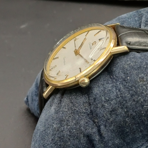 17 - Omega Gold face watch with Stainless Steel case.  Winder works and watch is running nicely.  It does... 