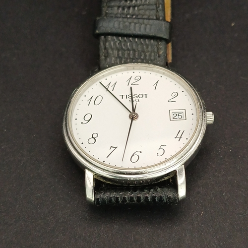 20 - Here we have two Gents Watches
1.  Tissot T870/970 with stainless steel face and case on leather str... 