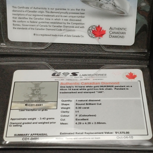 30 - Authentic Canadian Diamond set into  14 carat white gold pendant on a 14 carat white gold chain.  To... 