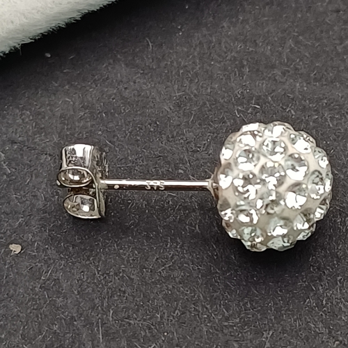 32 - Pair of Swarovski Crystallized Stud earrings set on 9 carat white gold.