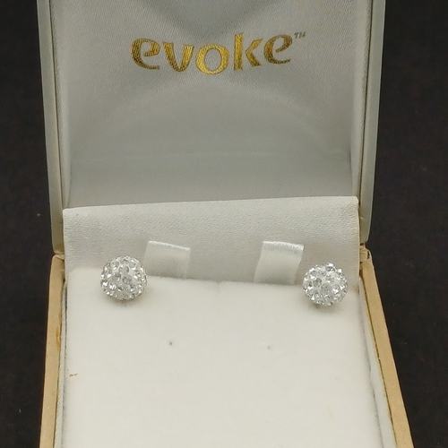 32 - Pair of Swarovski Crystallized Stud earrings set on 9 carat white gold.