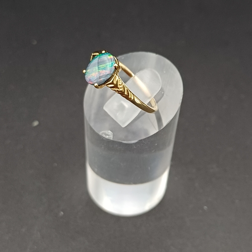 38 - Australian Opal Doublet Ring set in 9 carat yellow gold.  
- Size N / O
- weight 1.70g