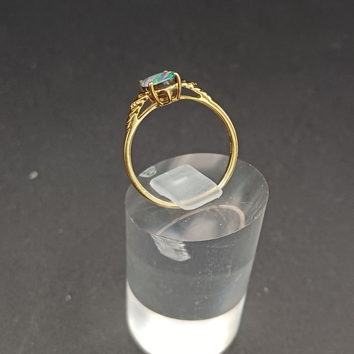 38 - Australian Opal Doublet Ring set in 9 carat yellow gold.  
- Size N / O
- weight 1.70g