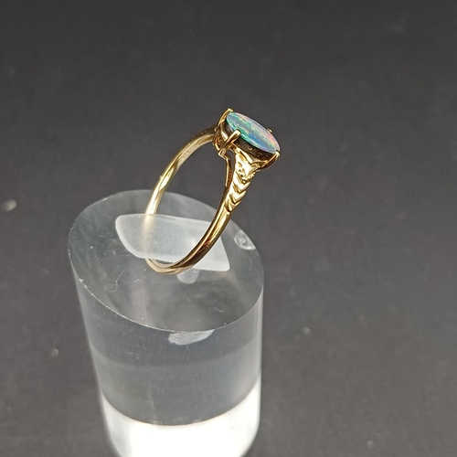 38 - Australian Opal Doublet Ring set in 9 carat yellow gold.  
- Size N / O
- weight 1.70g