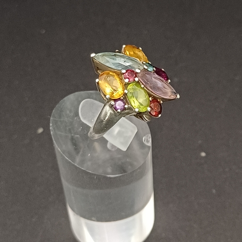 55 - Multi Gem Stone Ring set into 925 Silver.  This looks absolutely stunning on and not too large for s... 