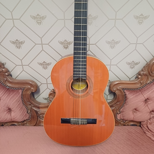 105 - Concert Grande Spanish Classical Guitar by BM of Spain.  This has a really beautiful sound in excell... 